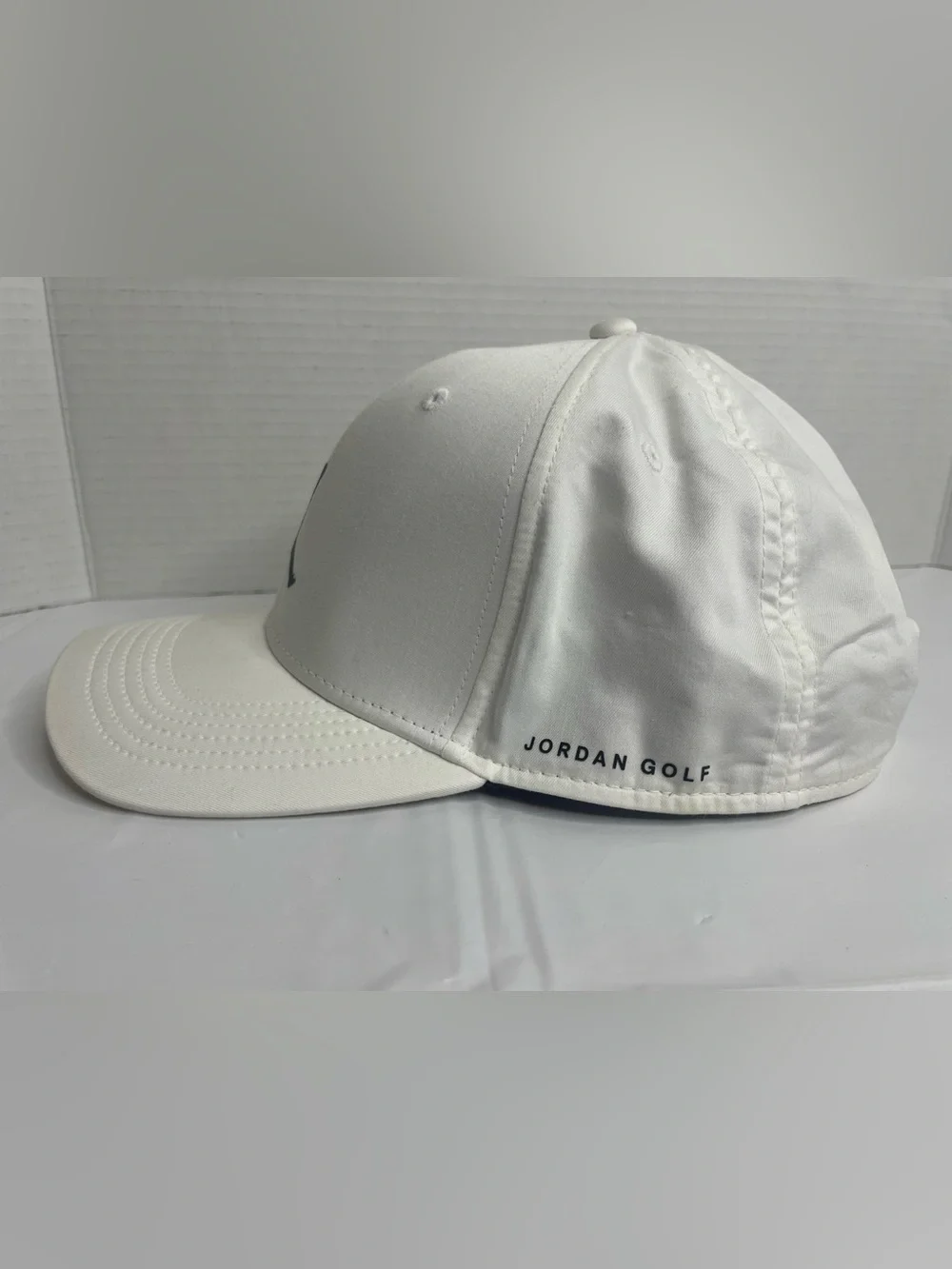 White Jordan Golf Dri-Fit adjustable SnapBack Cap with Black Jumpman Logo